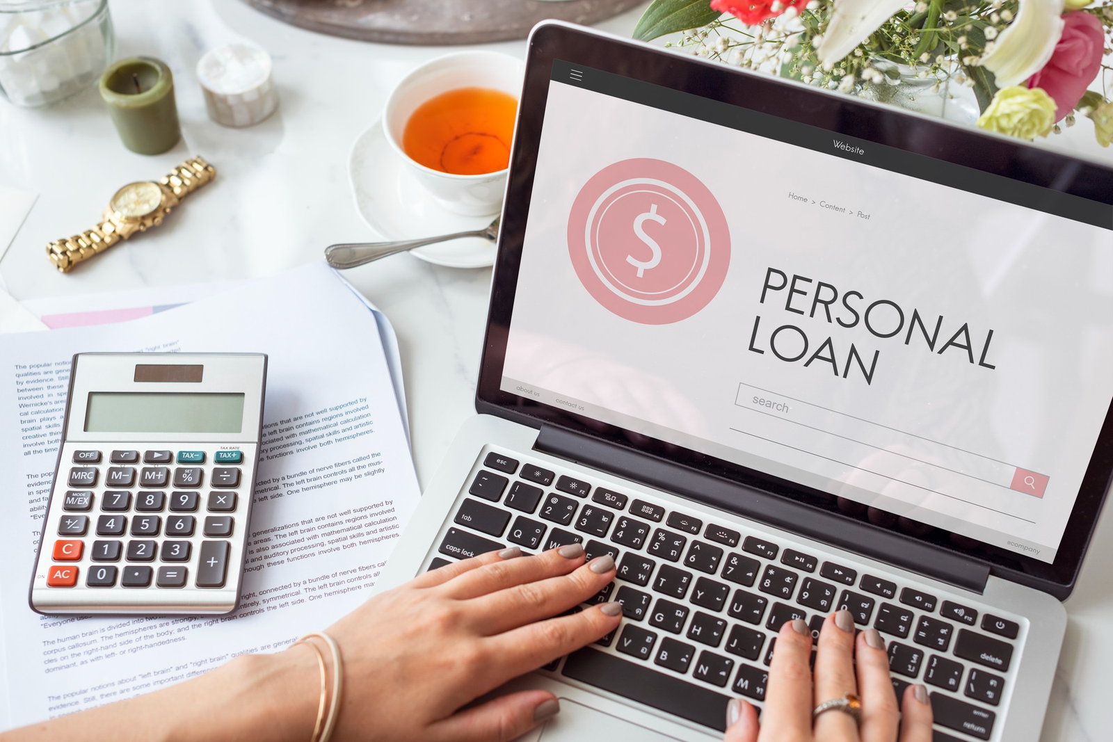 Laptop screen showing the words "Personal Loan"